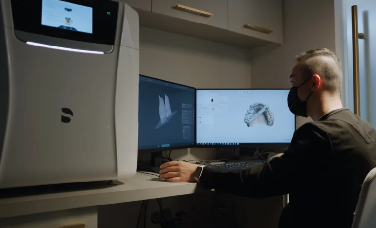 3D model showing full mouth dental implant restoration with implant posts and prosthetic teeth at Transcend Dentistry in Vancouver.